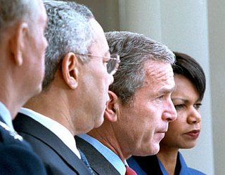 Colin Powell, George Bush en Condolleeza Rice